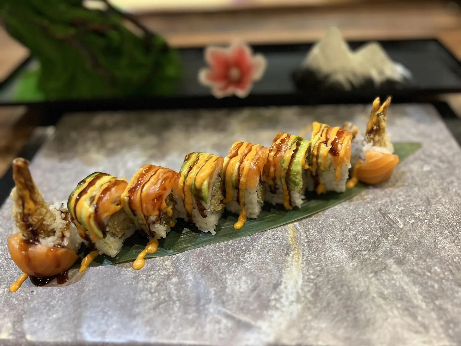 Sushi roll with double shrimp tempura, avocado and spicy sauce at Sushi Kingdom Glen Allen, a Japanese Restaurant in Glen Allen