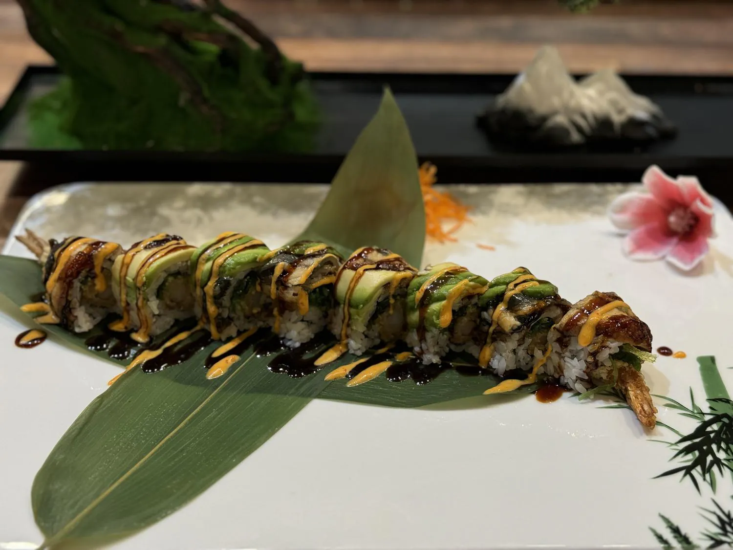 Sushi roll with shrimp tempura, avocado and spicy sauce at Sushi Kingdom Glen Allen, a Japanese Restaurant in Glen Allen