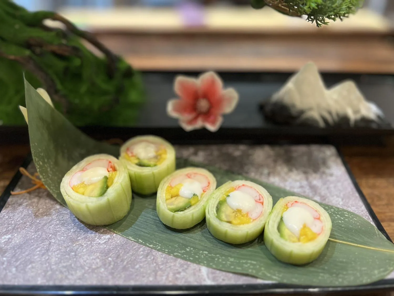 Vegetarian sushi roll with cucumber, mango and crab sticks at Sushi Kingdom Glen Allen, a Japanese Restaurant in Glen Allen